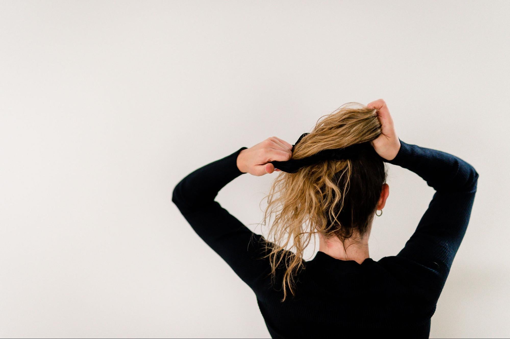 Adjustable hair scrunchie for athletes.